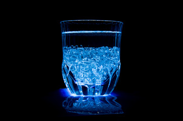 glass of whiskey with ice