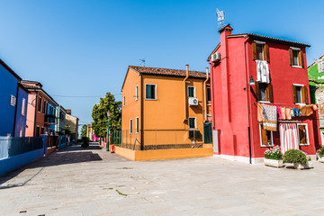 Street with bright houses on the island of Burano