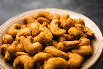 Kaju Pakoda/pakora OR Cashew Nut Fritters or bhajji, is a tasty snack from India, served as Chakna