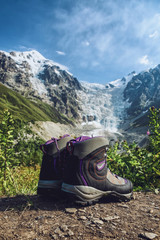  Trekking boots on Caucasus mountains background, Adish glacier, hiking boots