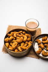 Kaju Pakoda/pakora OR Cashew Nut Fritters or bhajji, is a tasty snack from India, served as Chakna