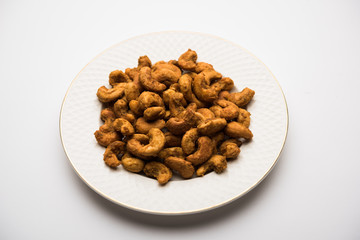 Kaju Pakoda/pakora OR Cashew Nut Fritters or bhajji, is a tasty snack from India, served as Chakna