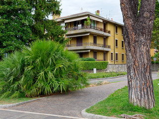 Sarnico, ITALY - August 7, 2019: Lake ISEO. Beautiful houses on a city street