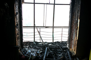 Burned interiors of industrial or residential building. Fire consequences concept. burnt balcony