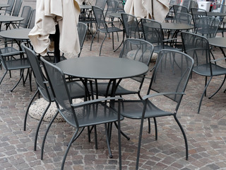 Sarnico, ITALY. street cafe tables stand on the pavement