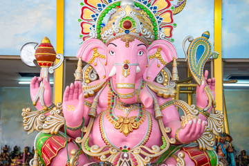 Pink god of elephant statue or Ganesha in Thailand, Ganesha statues are respected by Hindus in Thailand.