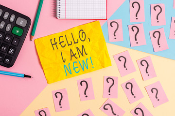 Writing note showing Hello I Am New. Business concept for introducing oneself in a group as fresh worker or student Mathematics stuff and writing equipment above pastel colours background