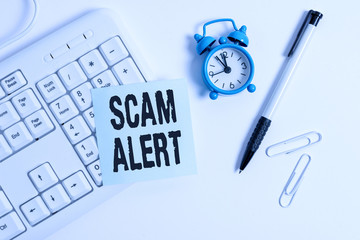 Conceptual hand writing showing Scam Alert. Concept meaning unsolicited email that claims the...