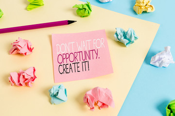 Writing note showing Don T Wait For Opportunity Create It. Business concept for work hard on yourself and begin from this moment Colored crumpled papers empty reminder blue yellow clothespin