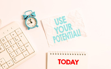 Text sign showing Use Your Potential. Business photo showcasing achieve as much natural ability makes possible Blank paper with copy space on the table with clock and pc keyboard