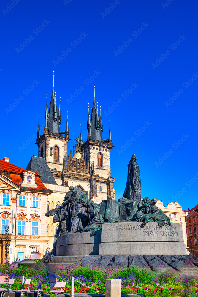 Sticker church of st. mary of týn in the old town square with the statue of jan hus in prague