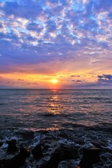 sunrise with clouds on the seashore