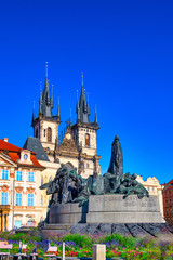 Fototapeta na wymiar Church of St. Mary of Týn in the Old Town Square with the Statue of Jan Hus in Prague
