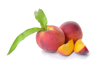 Ripe peaches on white background