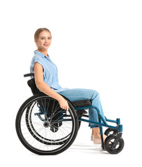 Fototapeta na wymiar Beautiful woman in wheelchair on white background