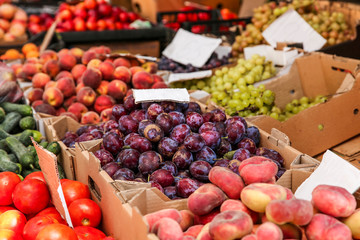 Assortment of fresh fruits on counter at market