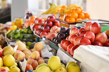 Assortment of fresh fruits on counter at market