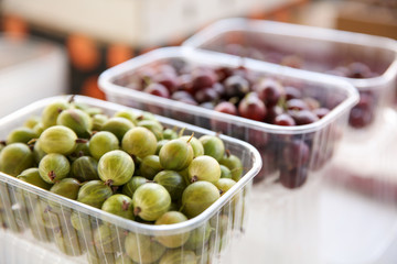 Fresh gooseberry on counter at market