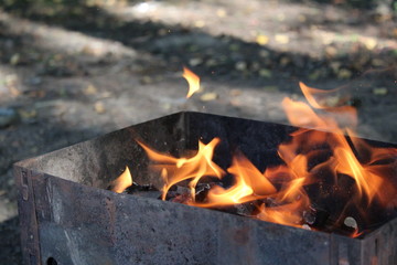 fire in the grill in nature.preparation for cooking barbecue.
