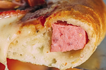 the rim of the pizza in the context of close-up