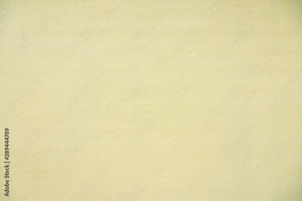 Wall mural yellow cement wall texture background