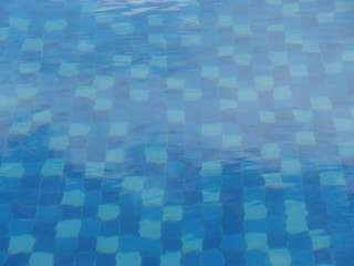 Close up image of water in a swimming pool 