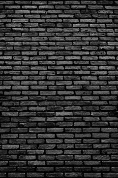 Surface of black brick stone wall textured for background