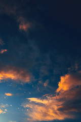 Evening sky, orange clouds and blue sky