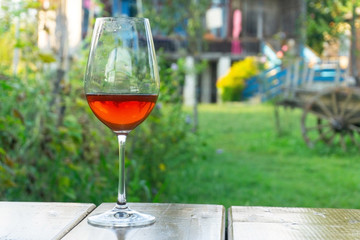 Home wine. Glass of red wine at a winery farm. Wine tasting.