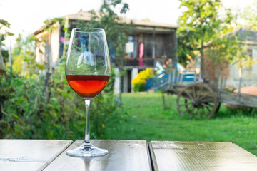 Home wine. Glass of red wine at a winery farm. Wine tasting.