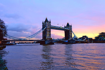 Fototapeta na wymiar Beautiful sunset on the river Thames at Tower Bridge with reflection light on the river.