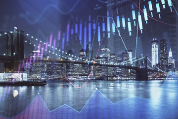 Naklejka premium Financial graph on night city scape with tall buildings background multi exposure. Analysis concept.