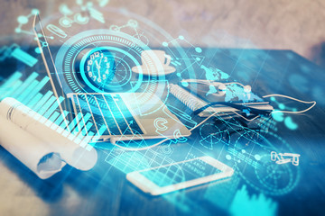 Double exposure of business theme icons and work space with computer background. Concept of success.