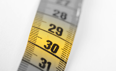 Measuring tape, selective focus on 30