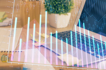 Multi exposure of graph and financial info and work space with computer background. Concept of...