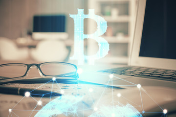 Crypto theme hologram with glasses on the table background. Concept of blockchain. Double exposure.