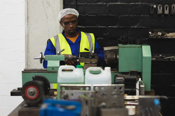 Male factory worker in the workshop at a factory