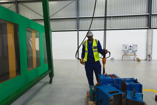 Male factory worker in a factory warehouse