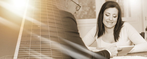 Woman meeting financial adviser in office, light effect; multiple exposure