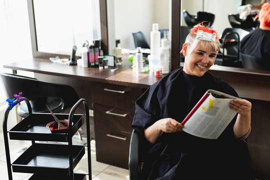 Female client having her hair coloured in hair salon