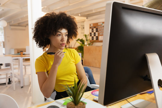 Young female creative in an office