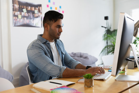 Young male creative in an office