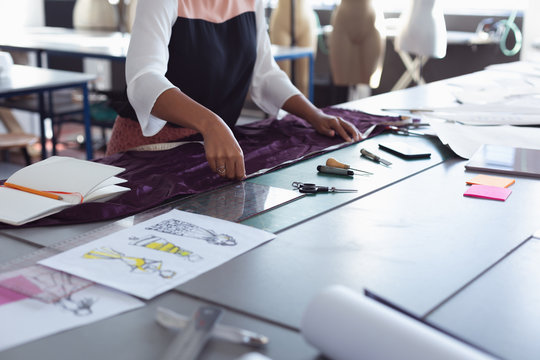 Female student working on a project at a fashion college