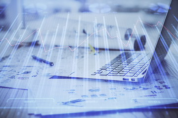 Fototapeta na wymiar Forex Chart hologram on table with computer background. Double exposure. Concept of financial markets.