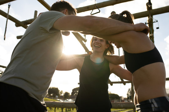 Young adults at an outdoor gym bootcamp