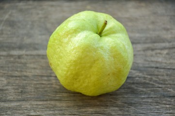 green guava on wood floor