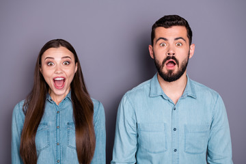 Close-up portrait of two her she his he nice attractive charming lovely cheerful cheery amazed brown-haired person agent broker expressing omg emotion isolated on gray violet purple background