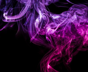 Colored smoke on black background