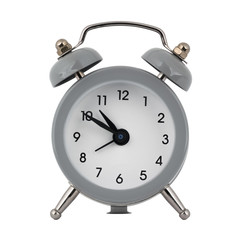 A gray clock with an alarm clock on a white background with arrows showing the time ten hours fifty minutes or twenty two hours fifty minutes