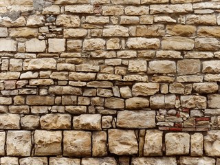 yellow stone wall of italy old town